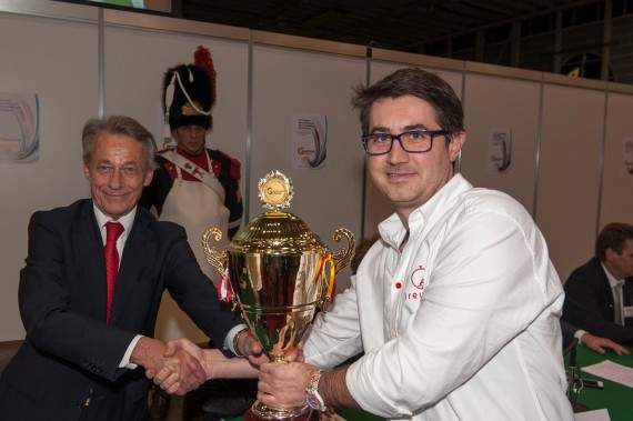 Bogdan Manoiu receiving the Grand Trophy from Jean Luc Vincent, President & Founder Geneva Invention Salon.